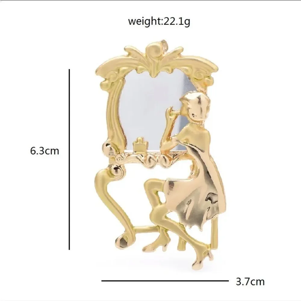 REFLECTION IN MIRROR BROOCH‎